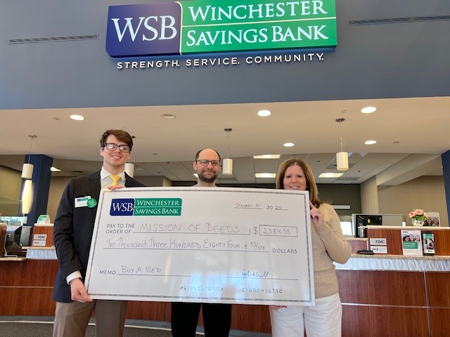 Winchester Savings Bank supporting Mission of Deeds with a community donation.